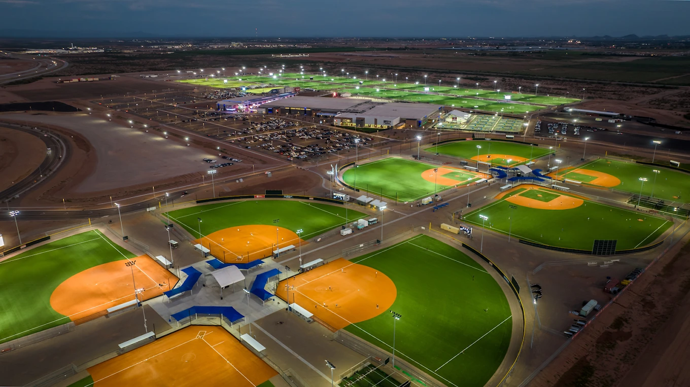 Existing AAG campus · baseball fields and fieldhouses at dusk